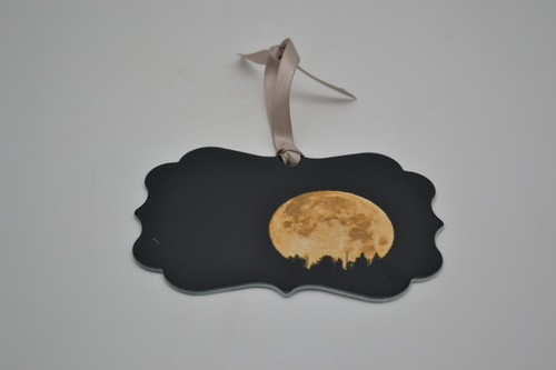 Two sided metal moon ornament - two,